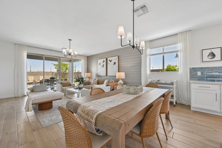 Dining and great room. Model home, finishes may vary. Dining and great room. Model home, finishes may vary.