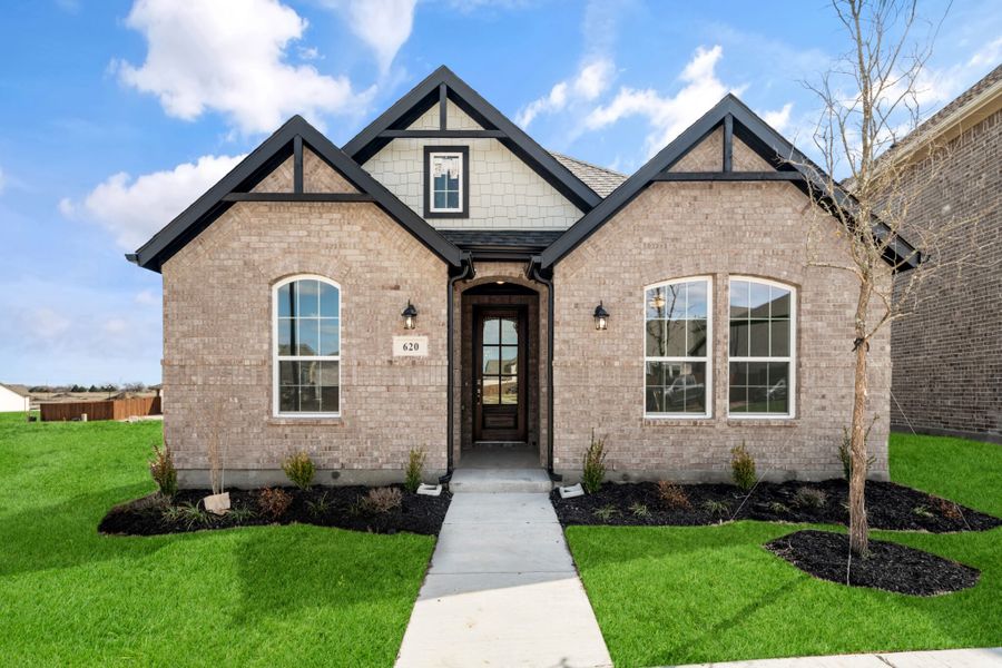 Front exterior of a new home in Edgewater, Fate, TX, highlighting curb appeal (Image 20).