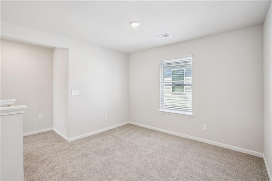 Spacious, unfurnished interior of a new home in Hawthorne Station, College Park (Image 36).