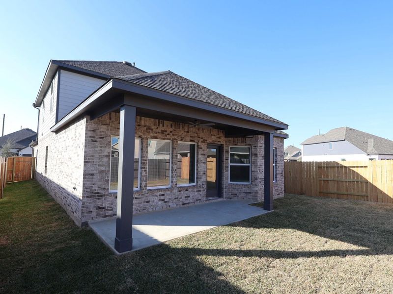 Exterior details and patio area of a home in Marvida, Cypress (Image 3).