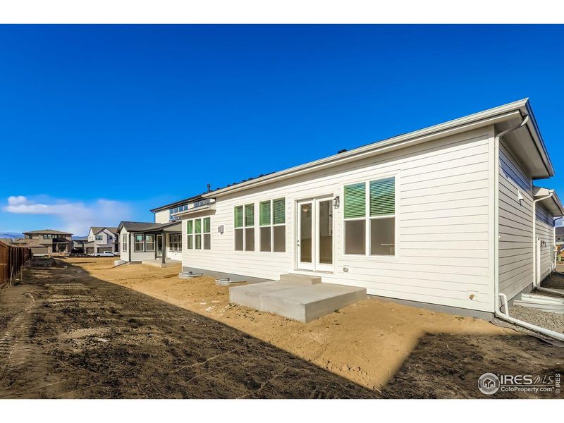 Exterior details and patio area of a home in RainDance, Windsor (Image 4).