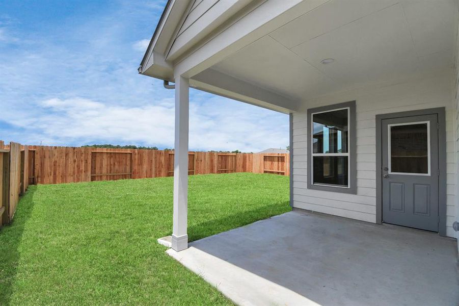 Come and see this spacious backyard with its beautiful covered patio. Sample photo of completed home with similar floor plan. Actual colors and selections may vary.