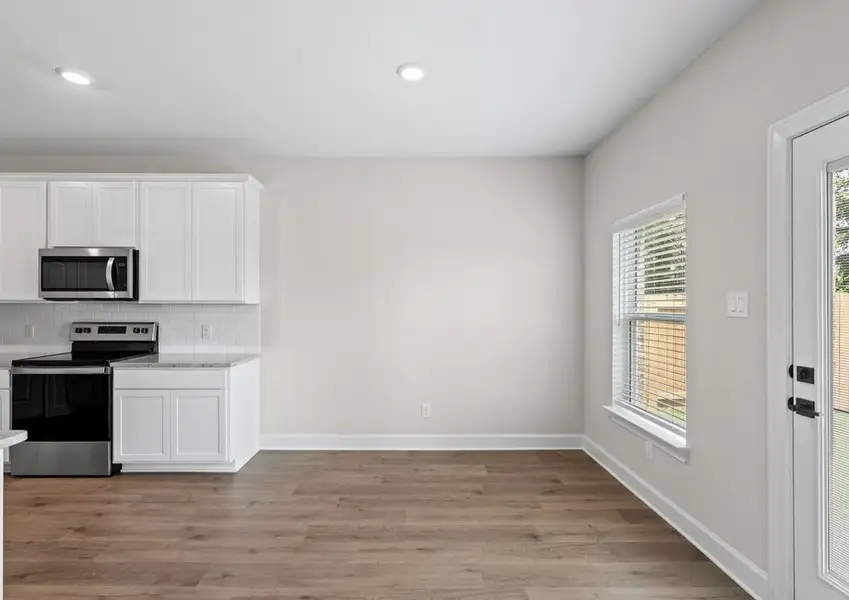 The dining room of the Cypress sits right off of the kitchen. The dining room of the Cypress sits right off of the kitchen.