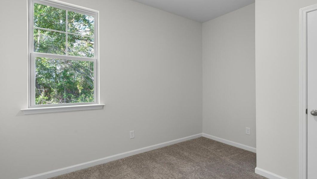 Spacious, unfurnished interior of a new home in The Preserve at Tidewater, Sneads Ferry (Image 18).