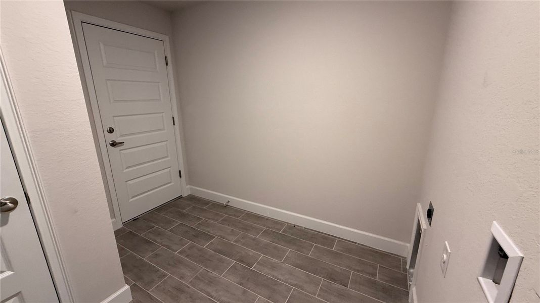 Spacious, unfurnished interior of a new home in Watercress Cove, North Port (Image 6). Spacious, unfurnished interior of a new home in Watercress Cove, North Port (Image 6).