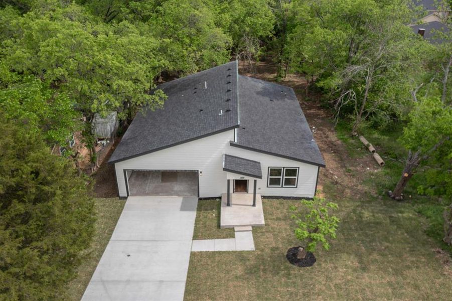 Front exterior of a new home in , Seagoville, TX, highlighting curb appeal (Image 25).