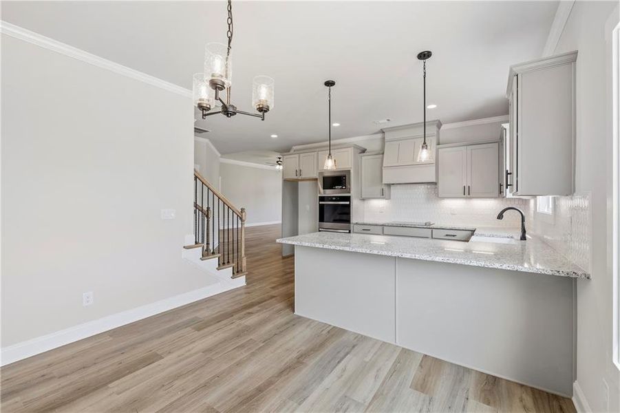 Furnished interior view inside a new home in , Monroe (Image 12).
