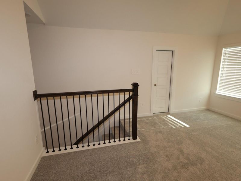 Spacious, unfurnished interior of a new home in Pinewood at Grand Texas, New Caney (Image 19).