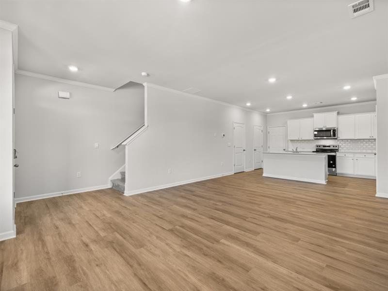 Spacious, unfurnished interior of a new home in Waypoint, Flowery Branch (Image 11).