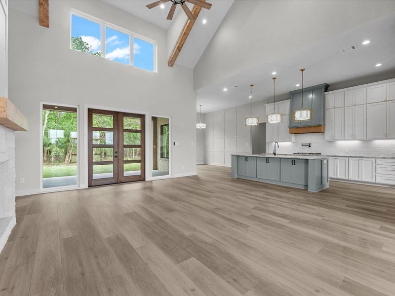 The great room has lots of windows for abundant natural light creating a warm first impression. The great room has lots of windows for abundant natural light creating a warm first impression.