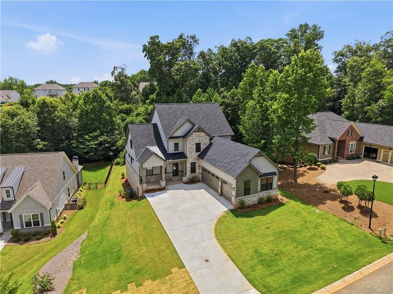Front exterior of a new home in , Jefferson, GA, highlighting curb appeal (Image 31).