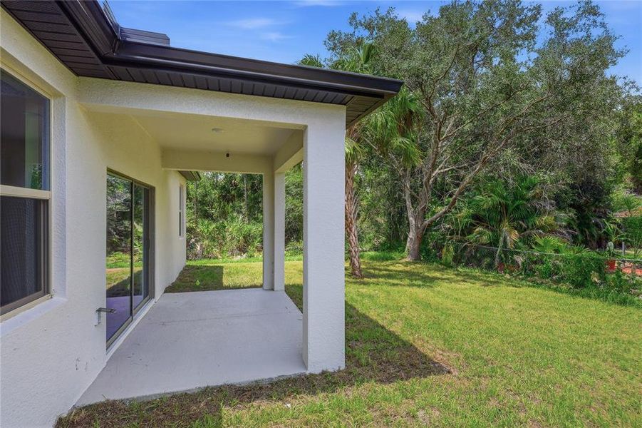 Exterior details and patio area of a home in , North Port (Image 18).