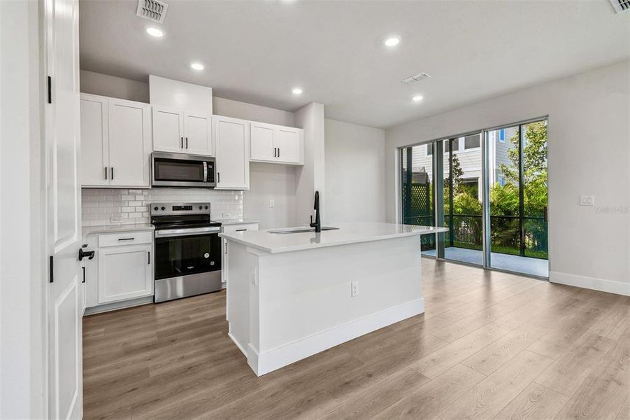 Furnished interior view inside a new home in North River Ranch – Townhomes, Parrish (Image 8).