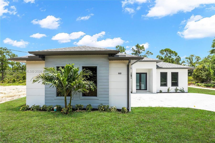 Front exterior of a new home in , Sebring, FL, highlighting curb appeal (Image 23). Front exterior of a new home in , Sebring, FL, highlighting curb appeal (Image 23).