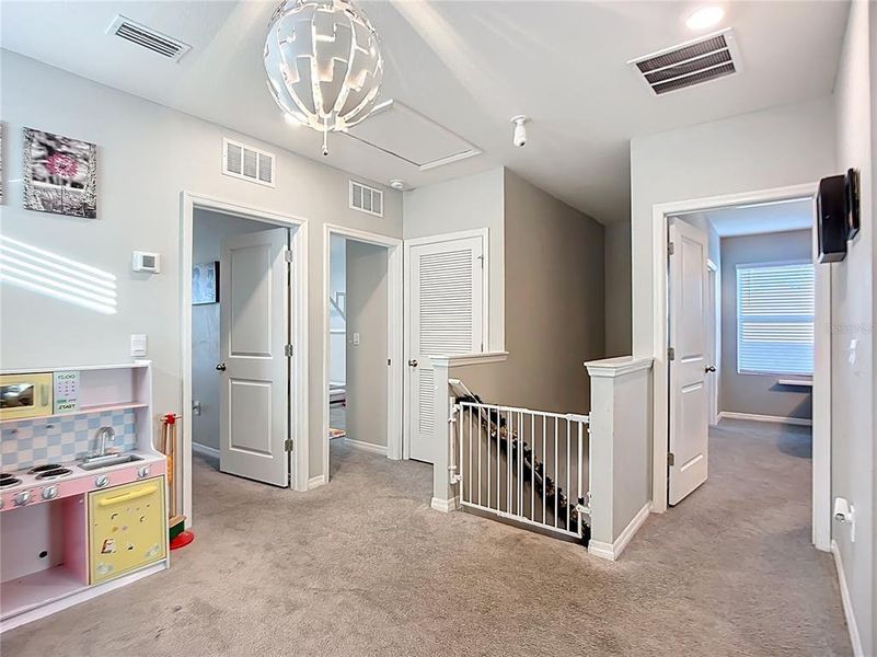 Furnished interior view inside a new home in Star Farms at Lakewood Ranch, Bradenton (Image 30).