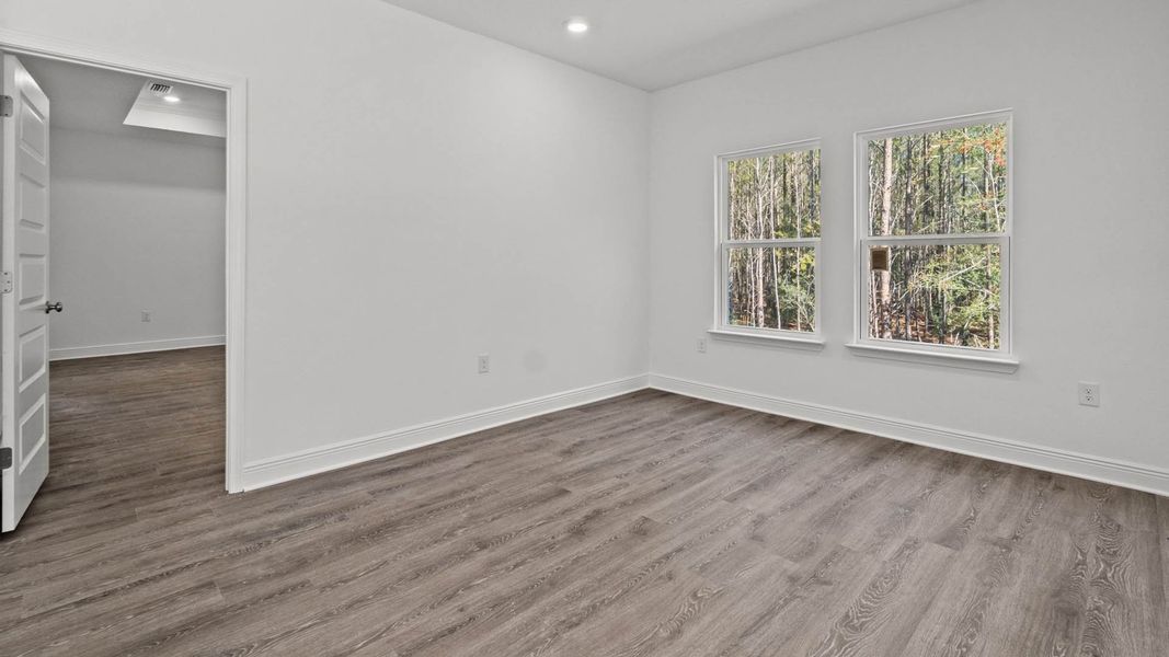 Representative unfurnished interior of a home built from the Camden by D.R. Horton in Owl's Head Farms, Freeport (Image 13).