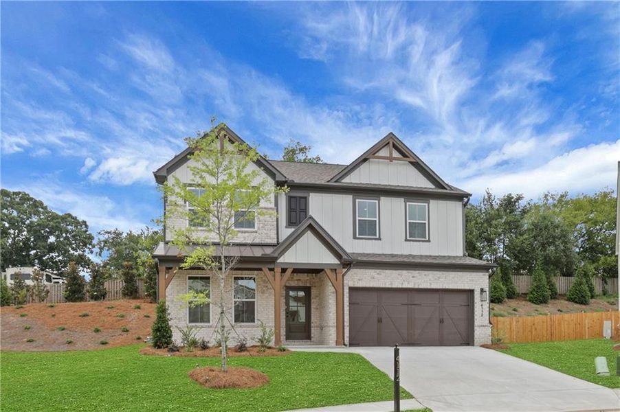 Front exterior of a new home in The Paddocks at Doc Hughes, Buford, GA, highlighting curb appeal (Image 27).