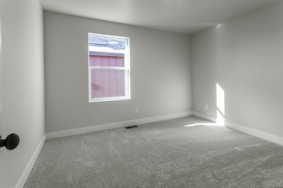 Representative unfurnished interior of a home built from the Tesla by Hartford Homes in Trailside, Timnath (Image 24).