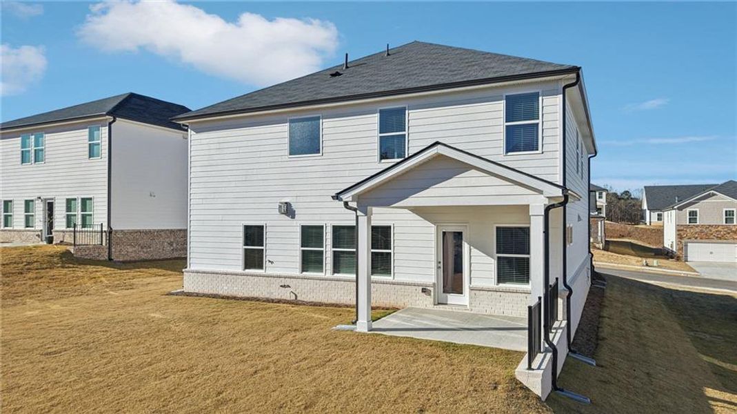 Exterior details and patio area of a home in Parkside at Grayson, Grayson (Image 3).