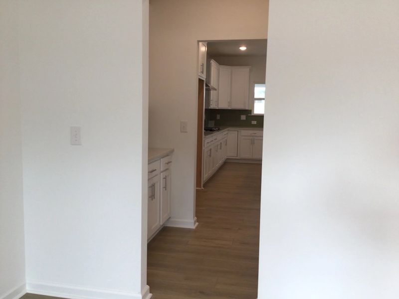 Butler’s Pantry featuring the AW Collection® Coastal - Glass-front storage with ocean tones.