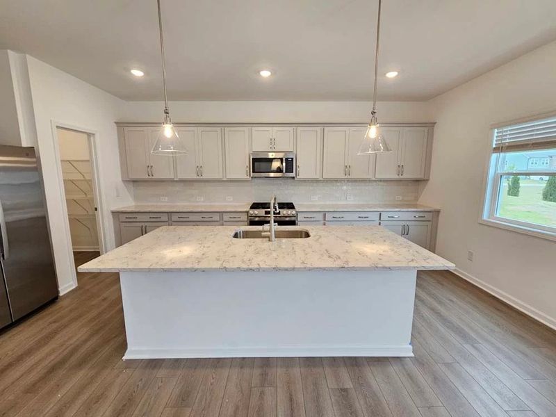 Kitchen featuring Milan Collection Finishes