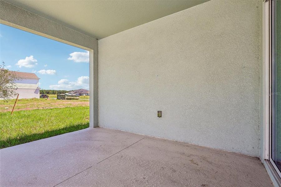 Exterior details and patio area of a home in Brack Ranch, St. Cloud (Image 4).