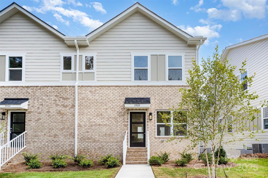 Front exterior of a new home in , Charlotte, NC, highlighting curb appeal (Image 23).