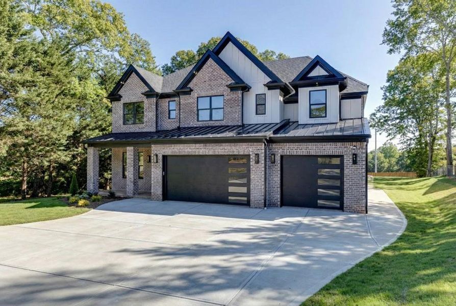 Front exterior of a new home in , Buford, GA, highlighting curb appeal (Image 25).