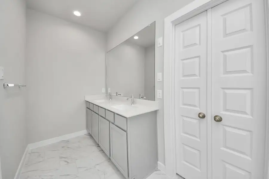 Experience a spa-like escape right in the heart of your primary bathroom. The expansive walk-in shower, surrounded by tile, and the distinctive garden tub with unique accents elevate your daily routine. Sample photo of completed home with similar floor plan. Actual colors and selections may vary. Experience a spa-like escape right in the heart of your primary bathroom. The expansive walk-in shower, surrounded by tile, and the distinctive garden tub with unique accents elevate your daily routine. Sample photo of completed home with similar floor plan. Actual colors and selections may vary.