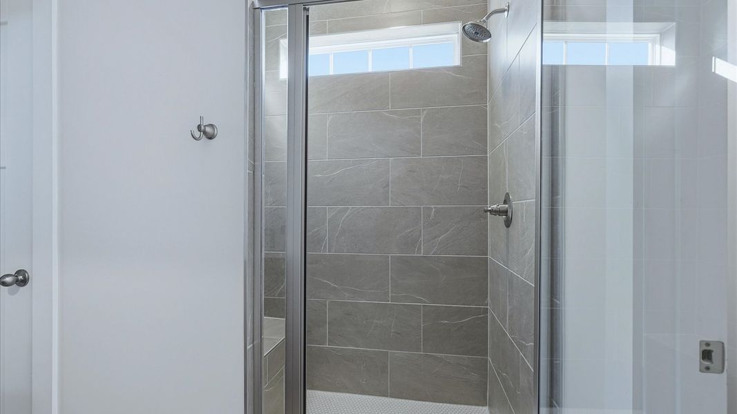 Superior en-suite primary bathroom with stylish walk-in shower—crafted with high standards in mind near Downtown Simpsonville
