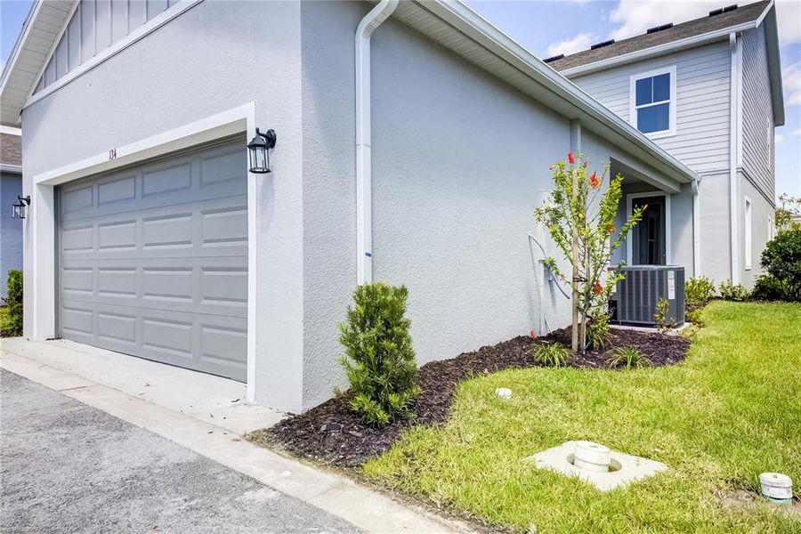 Exterior details and patio area of a home in Bungalow Walk at Lakewood Ranch, Sarasota (Image 23).