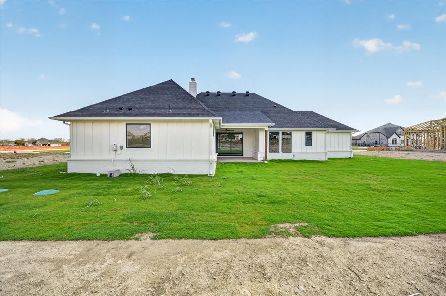 Front exterior of a new home in Paloma Ranches, Justin, TX, highlighting curb appeal (Image 19). Front exterior of a new home in Paloma Ranches, Justin, TX, highlighting curb appeal (Image 19).