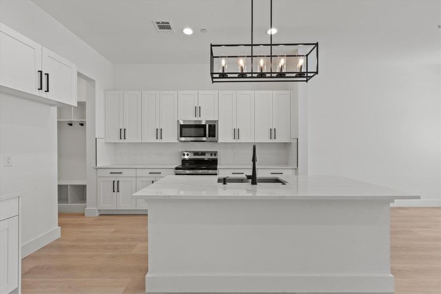 Furnished interior view inside a new home in , Rowlett (Image 9).