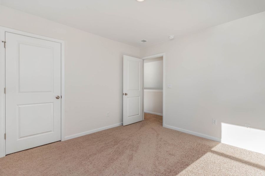 Representative unfurnished interior of a home built from the HAYDEN by D.R. Horton in Island Green, Myrtle Beach (Image 19).