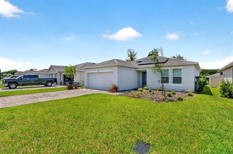 Front exterior of a new home in , Edgewater, FL, highlighting curb appeal (Image 20). Front exterior of a new home in , Edgewater, FL, highlighting curb appeal (Image 20).