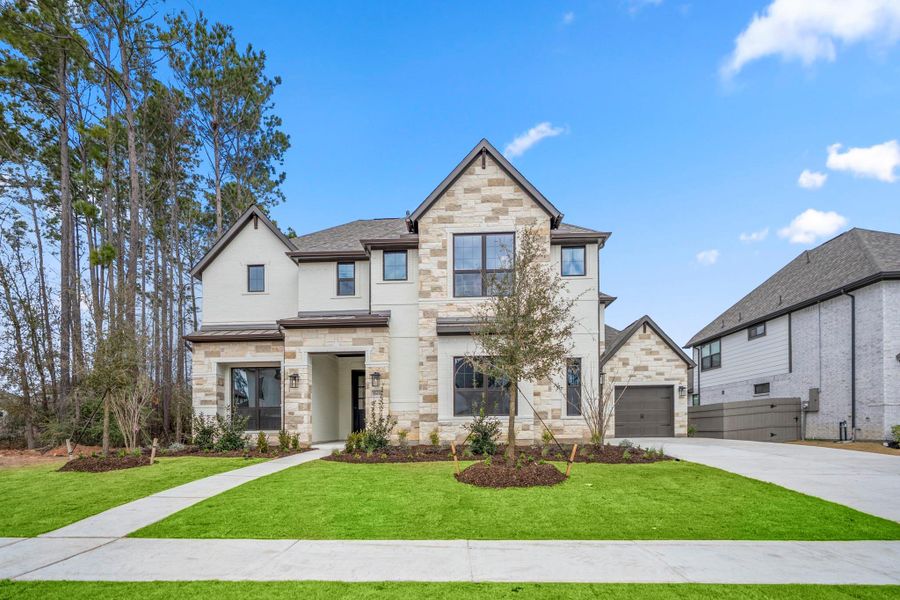 Front exterior of a new home in Artavia 70′ Lots, Conroe, TX, highlighting curb appeal (Image 24).