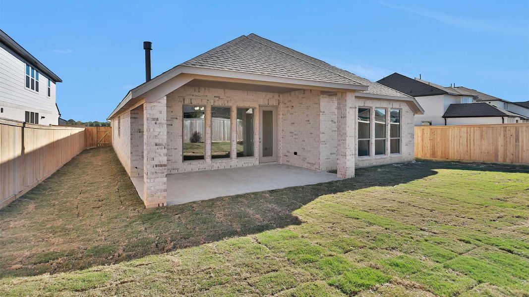Exterior details and patio area of a home in Bridgeland 50', Cypress (Image 3).