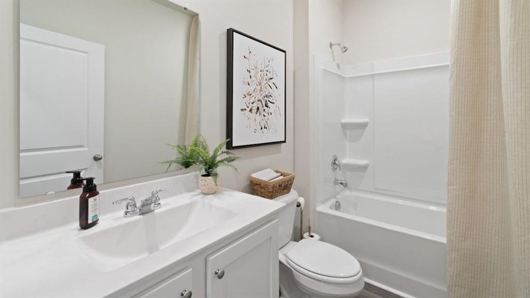 Furnished interior view inside a new home in The Landing at Hidden Lakes, McKinney (Image 19). Furnished interior view inside a new home in The Landing at Hidden Lakes, McKinney (Image 19).