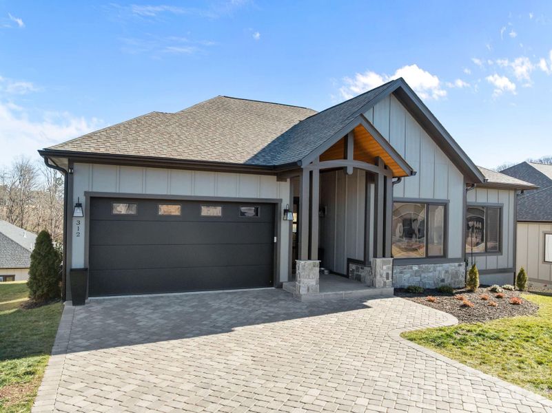 Front exterior of a new home in , Arden, NC, highlighting curb appeal (Image 21).