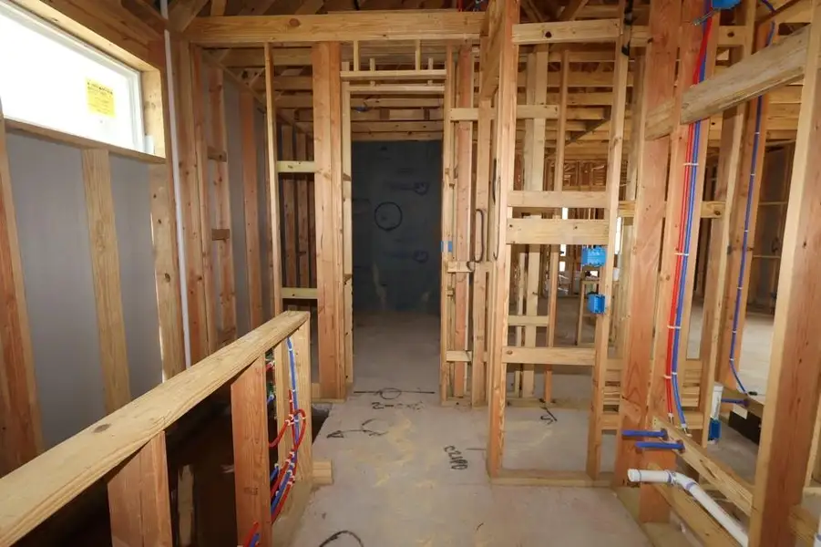 In-progress construction of a new home in The Highlands 40', Porter, TX (Image 4).