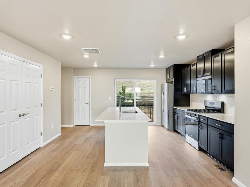 Furnished interior view inside a new home in Three Hills, Morrison (Image 5).