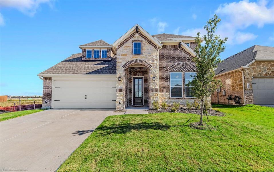 Front exterior of a new home in , Forney, TX, highlighting curb appeal (Image 20).
