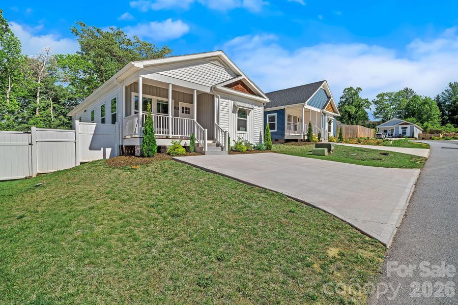Exterior details and patio area of a home in , Asheville (Image 19).