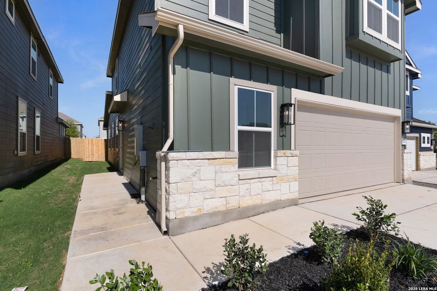 Exterior details and patio area of a home in Casinas at Gruene, New Braunfels (Image 3).