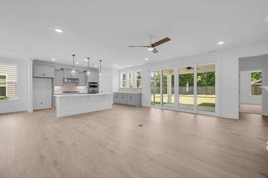 Representative furnished interior of a home built from the The Highland by RobuckHomes in Windwater, Hampstead (Image 16).