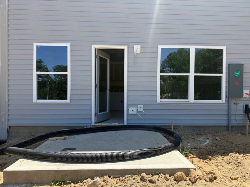 Exterior details and patio area of a home in Towns at The Point, Rolesville (Image 3).
