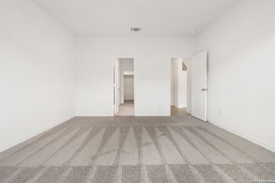 Spacious, unfurnished interior of a new home in Hidden Bluffs at TRP, San Antonio (Image 14).