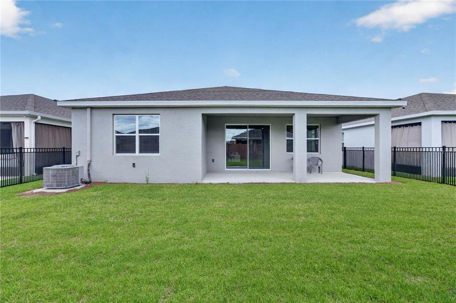 Exterior details and patio area of a home in , Ocala (Image 27).