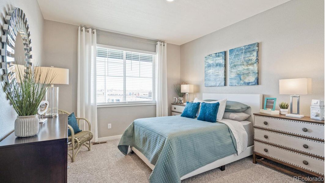 Furnished interior view inside a new home in Trails at Crowfoot, Parker (Image 2).