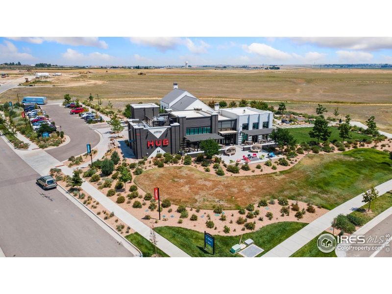 Front exterior of a new home in Kinston at Centerra, Loveland, CO, highlighting curb appeal (Image 1).